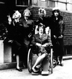  What a DRAG it is getting old > the Rolling Stones play dress-up on cover of single Have You Seen Your Mother, Baby, Standing In the Shadow > September 1966. A wheelchaired Bill Wyman [no, he wasn’t really disabled]; guitarist Brian Jones with a fag; grandma Keith Richards; Mick Jagger still doing his best to look beautiful and a decidedly uncomfortable Charlie Watts.. 